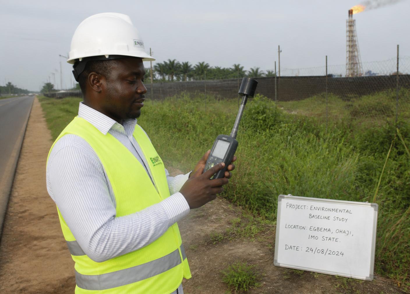 AREC field researcher collecting environmental samples on site